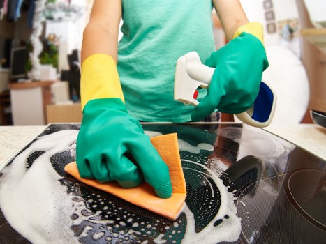 Professional cleaning of stubborn spills and marks on fabric surfaces